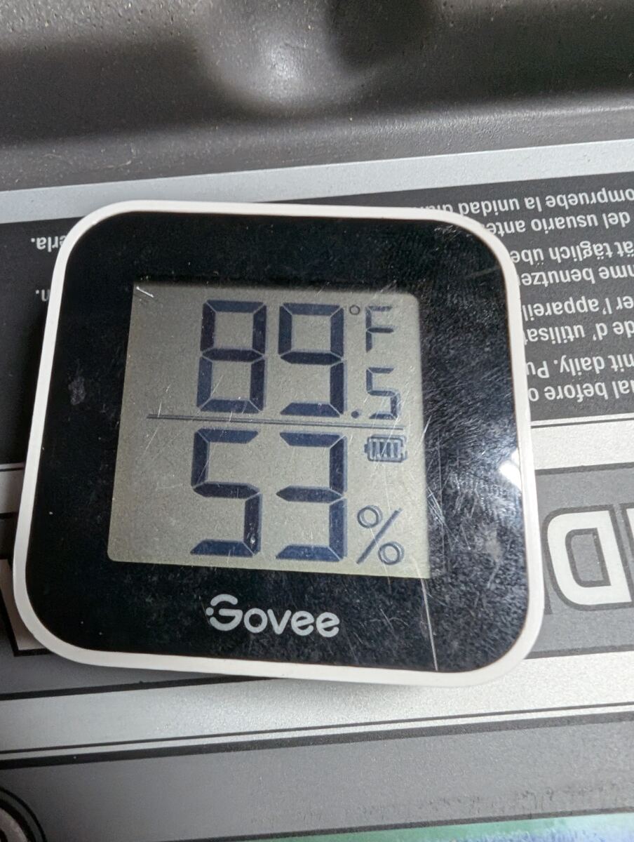 Hygrometer reading 53 percent humidity after two days of drying with the rental dehumidifier